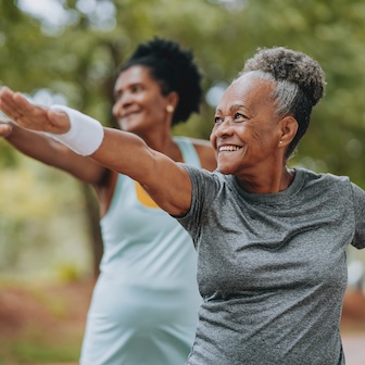 Build healthy habits - an image of two women doing yoga